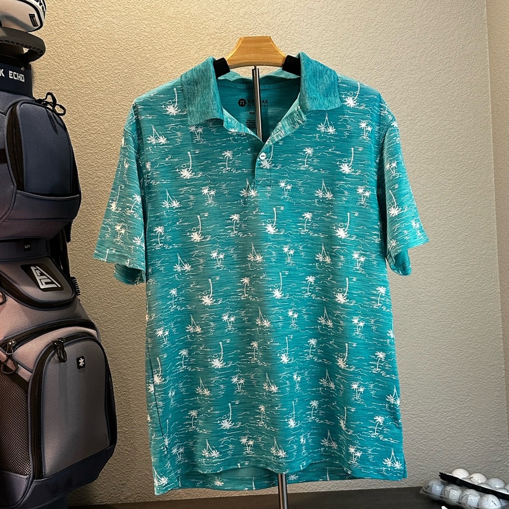 Blue Polo Shirt with Tropical Pattern and Short Sleeves